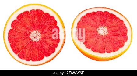 Grapefruit halves isolated on white background close up. Ripe slices of pink grapefruit citrus fruit  Flat lay. Top view. Stock Photo
