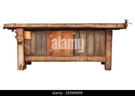 Old carpenter wooden work bench isolated on a white background Stock Photo