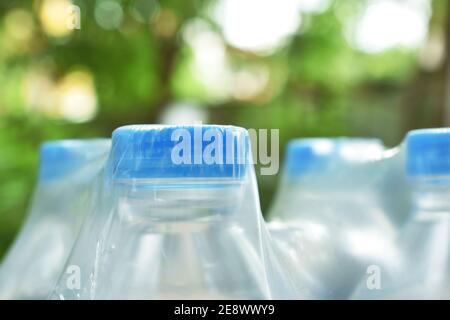 fresh water plastic bottle with blue cap in clear packaging Stock Photo