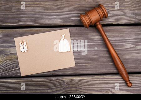 Marriage gavel and copy space on beige paper. Stock Photo