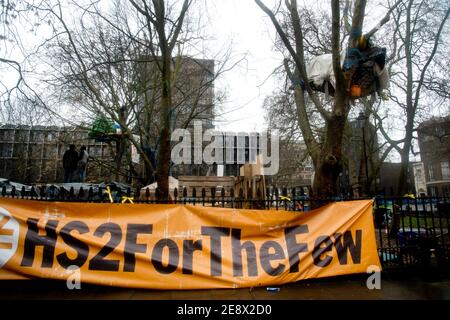 Protest at Euston Square, London over the proposed felling of trees as part of the construction of HS2 high speed rail link. Protesters also tunnelled Stock Photo