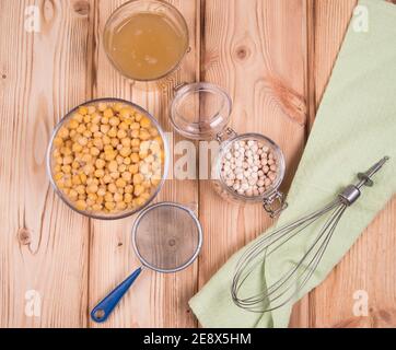 Aquafaba chickpea broth is used as a substitute for eggs in the preparation of many vegan dishes. Stock Photo