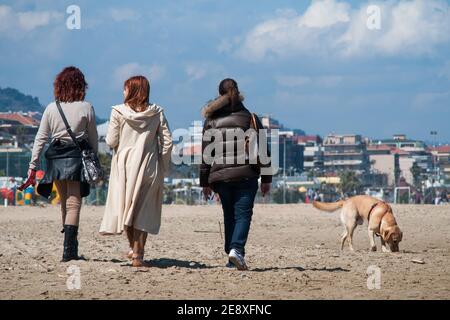 Termoli (CB),Molise Region,Italy:Three women stroll along the northern promenade of Termoli. Stock Photo