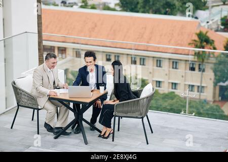 Business people discussing documents Stock Photo