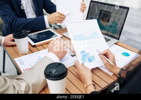 Colleagues discussing business activity Stock Photo
