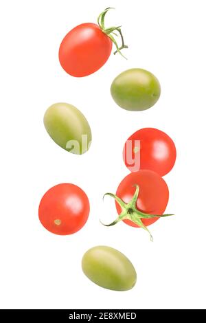 Seven pieces of flying fresh salad ingredients on white background Stock Photo