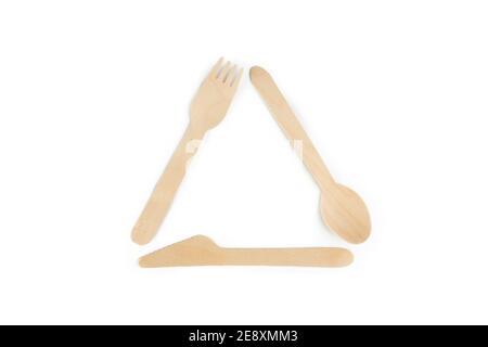eco friendly recycling symbol from wooden utensil elements isolated on a white background. the earth protection from pollution. Stock Photo