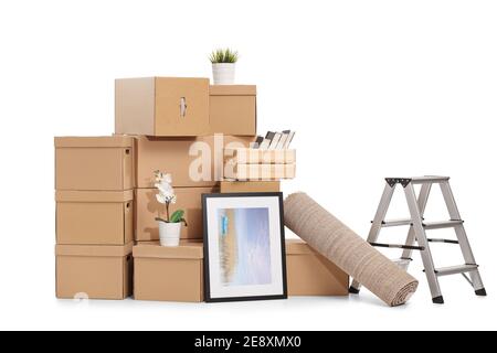Pile of cardboard boxes packed with items for home removal isolated on white background Stock Photo