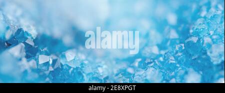 Winter Background with Blue Cold Crystals, with Beautiful Light.  Copy Space. Banner format. Stock Photo