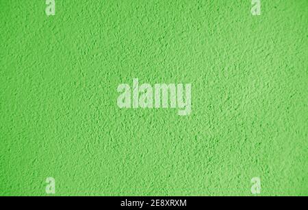 Abstract grainy texture on green wall. It can be used as a design element and background Stock Photo