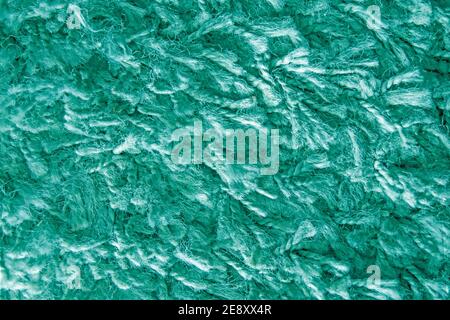 Texture of long-haired carpet in light blue, fur texture close-up for designers Stock Photo