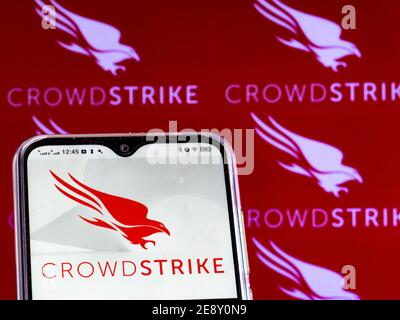 In this photo illustration a CrowdStrike Holdings, Inc. logo is seen displayed on a smartphone screen. Stock Photo