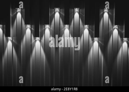 Spotlights on the wall and downward beams - wall backdrop with spot lighting - theater curtain Stock Photo