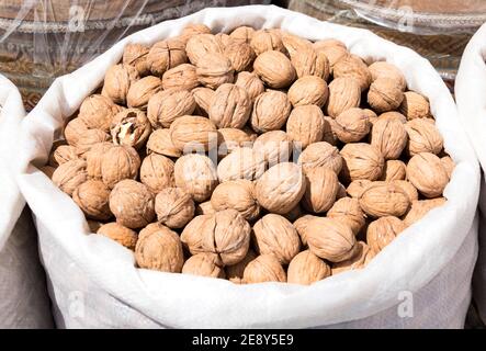 sack of Walnuts in shells Stock Photo