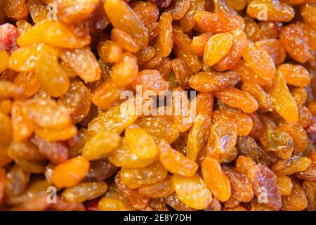dried grapes, dark raisins in bowl, Stock Photo