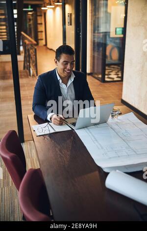 Architect using his laptop in the workplace Stock Photo