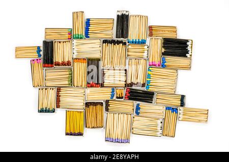multicolored match sticks in boxes on a white background Stock Photo