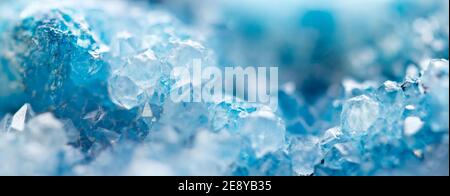 Blue Crystals. Macro. Winter Backgroun.Beautiful Light. Banner format. Stock Photo