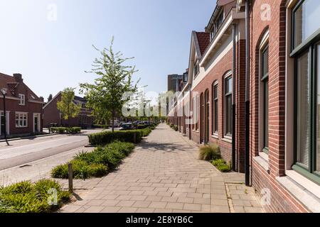 Eindhoven, The Netherlands, April 21st 2020. View of a street where the former Philips employees used to live near the center of Eindhoven on a sunny Stock Photo