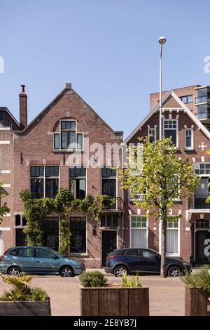 Eindhoven, The Netherlands, April 21st 2020. Exterior facade of the residential houses at the Catherinaplein on a sunny day during corona lockdown. Hi Stock Photo