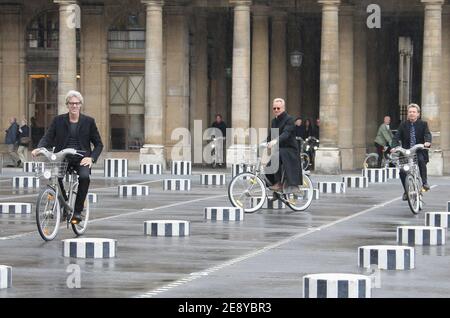 Members of rock band 'The Police', US drummer Stewart Copeland, British singer and bassist Sting (L) and guitarist Andy Summers ride 'Velib' bicycles prior to be awarded into the Order of Arts and Letters by French culture minister, Christine Albanel in Paris, France on October 1, 2007. Photo by Frederic Nebinger/ABACAPRESS.COM Stock Photo