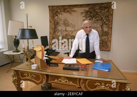 EXCLUSIVE - French Socialist Dominique Strauss-Kahn (R), newly appointed at the head of the International Monetary Fund, is pictured at the IMF's office in Paris, France on October 1st, 2007. Strauss-Kahn, former Economy Minister, was elected 28 September 2007 as IMF new chief as the troubled institution sought to redefine itself in the face of increasing skepticism globally. Photo by Mousse/ABACAPRESS.COM Stock Photo