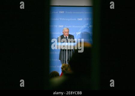 The reflection of French Socialist Dominique Strauss-Kahn, newly appointed at the head of the International Monetary Fund, is seen as he gives a press conference at the IMF's office in Paris, France on October 1st, 2007. Strauss-Kahn, former Economy Minister, was elected 28 September 2007 as IMF new chief as the troubled institution sought to redefine itself in the face of increasing skepticism globally. Photo by Mousse/ABACAPRESS.COM Stock Photo