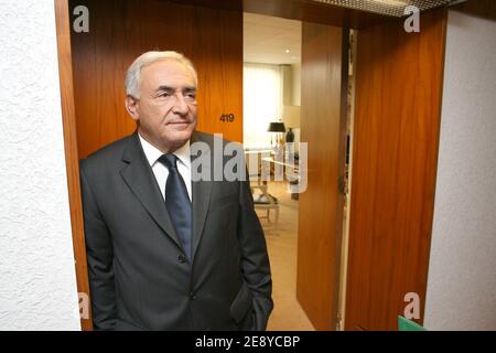 EXCLUSIVE - French Socialist Dominique Strauss-Kahn (R), newly appointed at the head of the International Monetary Fund, is pictured at the IMF's office in Paris, France on October 1st, 2007. Strauss-Kahn, former Economy Minister, was elected 28 September 2007 as IMF new chief as the troubled institution sought to redefine itself in the face of increasing skepticism globally. Photo by Mousse/ABACAPRESS.COM Stock Photo