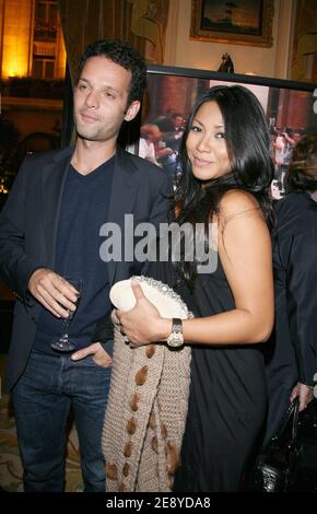 Indonesian born singer Anggun shows her pregnacy as she attends with her boyfriend fashion designer Jean-Louis Scherrer's new book launch party held at Four Seasons Hotel in Paris, France on October 2, 2007. Photo by Denis Guignebourg/ABACAPRESS.COM Stock Photo