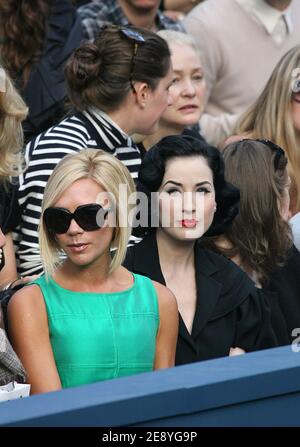 Victoria Beckham and Dita Von Teese attend the Chanel Spring-Summer