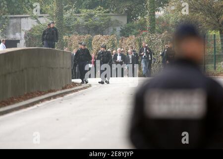 High Court judge Scott Baker and the jurors involved in the inquest of princess Diana at the Pont de l'Alma tunnel in Paris, France on October 8, 2007. The 11 jurors, who began hearing evidence on the death of Diana and her lover Dodi Al Fayed in London last week, are set to visit the Ritz Hotel to see where the couple dined on the night they died, and the Pont de l'Alma tunnel to see the spot where the Mercedes the couple were travelling in crashed 10 years ago. Photo by Mousse/ABACAPRESS.COM Stock Photo