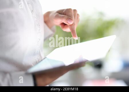 Business woman hands using digital tablet closeup Stock Photo