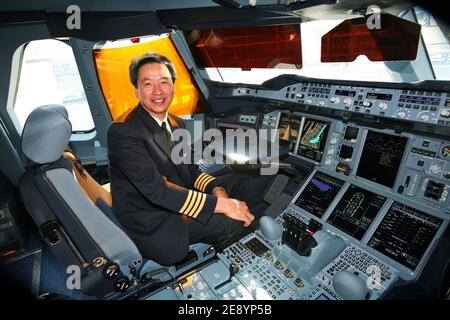 Captain pilot Robert Ting, inside the cokpit aboard the first Airbus A380, the world's largest passenger aircraft, as the delivery of it is made to Singapore Airlines following a ceremony at the Airbus delivery centre in Toulouse, France on October 15, 2007. Airbus claims the A380 offers a much quieter and more spacious cabin than its rivals. It can carry up to 853 passengers in an economy class-only configuration, but Singapore Airlines' A380's will have 471 seats. Photo by Pascal Parrot/ABACAPRESS.COM Stock Photo