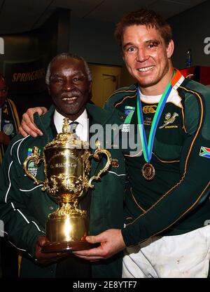 John Smit of South Africa poses with the trophy and South African President Thabo Mbeki following his team's victory at the end of the 2007 Rugby World Cup Final between England and South Africa at the Stade de France on October 20, 2007 in Saint-Denis, near Paris France. Photo by David Rogers/Pool/Cameleon/ABACAPRESS.COM Stock Photo