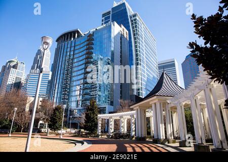 A view of the Charlotte, North Carolina, skyline in a bright blue sky as seen from Romare Bearden Park. Stock Photo