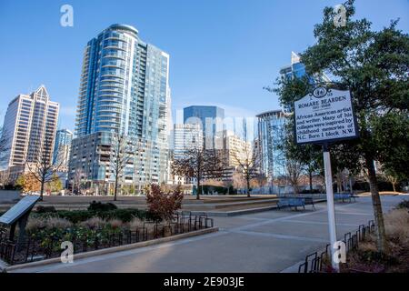 A view of the Charlotte, North Carolina, skyline in a bright blue sky as seen from Romare Bearden Park. Stock Photo