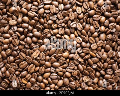 Roasted coffee beans. Flat lay, top view. Stock Photo