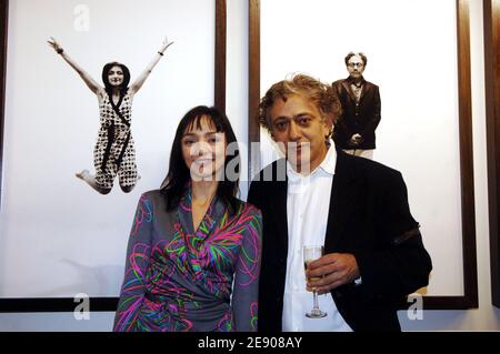 Actress Maria De Medeiros and director Elia Suleiman visit the photos exhibition 'One Jump' by Alex Majoli from Magnum agency at the Pinacotheque in Paris, France on November 19, 2007. For his work, Alex Majoli asked actors and actresses to jump in front of his camera to celebrate the 60th Cannes Film Festival. Photo by Giancarlo Gorassini/ABACAPRESS.COM Stock Photo