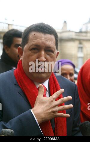 Venezuelan president Hugo Chavez addresses the press as he leaves the ...