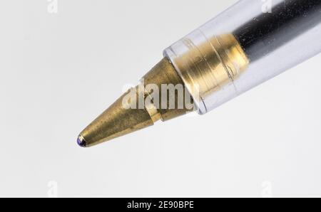 Macro photograph of ball point biro pen. Extremely close up focused on the ball tip. Stock Photo