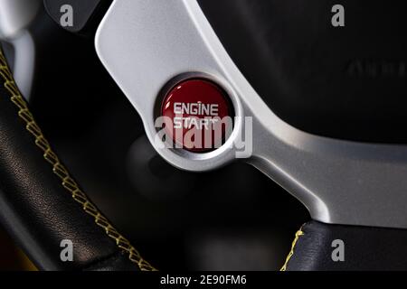 Start and stop engine push button in sports car Stock Photo