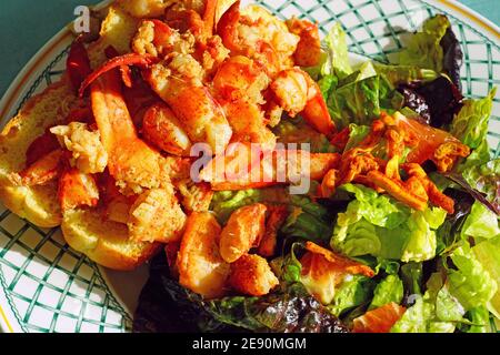 Fresh homemade lobster rolls with a salad Stock Photo