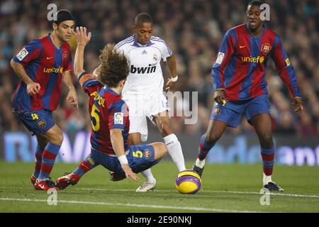 Real Madrid's Julio Baptista is challenged by FC Barcelona's Carles Puyol during the Spanish League soccer match, FC Barcelona vs Real Madrid at the Camp Nou Stadium in Barcelona, Spain on December 23, 2007. Real Madrid won 1-0. Photo by Christian Liewig/ABACAPRESS.COM Stock Photo