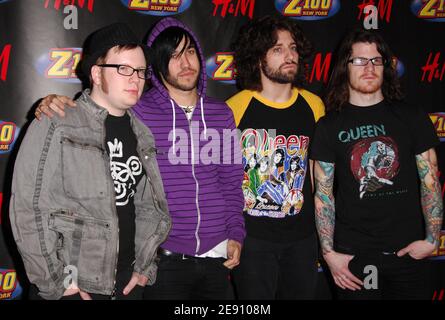 (L-R) Musicians Patrick Stump, Pete Wentz, Andy Hurley and Joe Trohman of Fall Out Boy pose for a photo in the press room during Z100's Jingle Ball 2007 at Madison Square Garden in New York City, USA on December 14, 2007. Photo by Gregorio Binuya/ABACAUSA.COM (Pictured : Patrick Stump, Pete Wentz, Andy Hurley, Joe Trohman, Fall Out Boy) Stock Photo