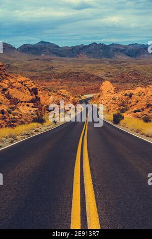 Classic american southwest road during a road trip to famous national parks - Scenic Drive, Valley of Fire State Park - United States Stock Photo