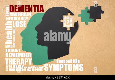 Human heads on color background. Concept of dementia Stock Photo