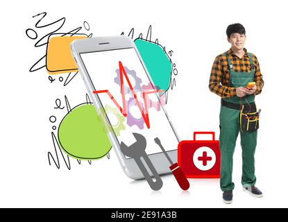 Repair technician with modern mobile phone on white background Stock Photo
