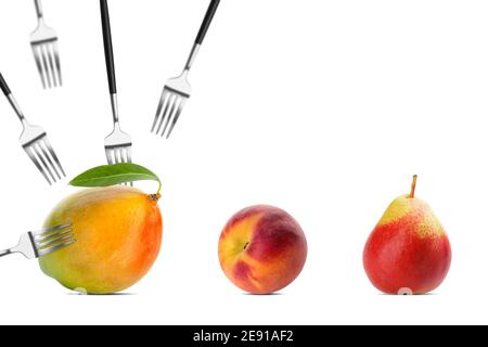 Many forks and different fruits on white background Stock Photo