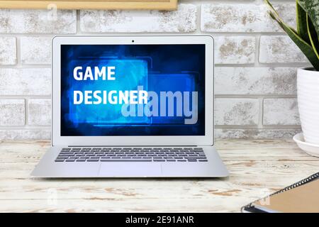 Modern workplace of video games designer with computer in studio Stock Photo