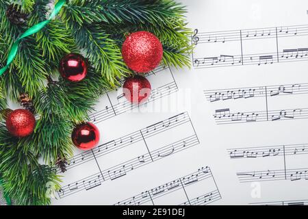 Music sheets with notes and Christmas decor Stock Photo